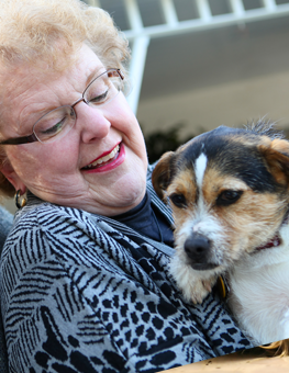 An elderly person can derive many benefits from owning a dog