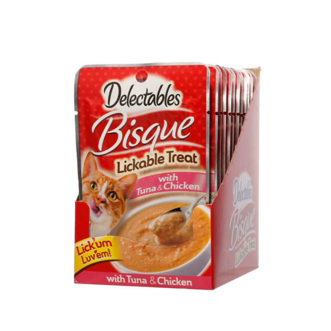 Hartz Delectables Lickable treats for cats. Tuna and chicken bisque. Front of opened carton angled.