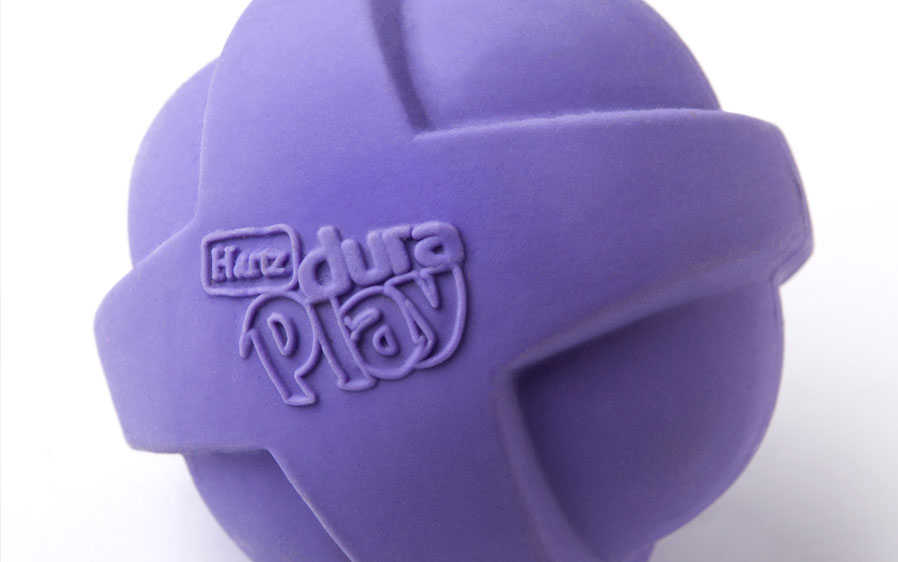 purple squeaky ball dog toy