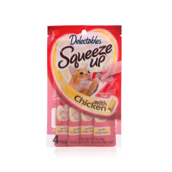 Delectables SqueezUp chicken is the first gourmet wet cat treat where feeding is interactive. Front of package picturing a cat eating from a squeezeup tube being held by a hand.