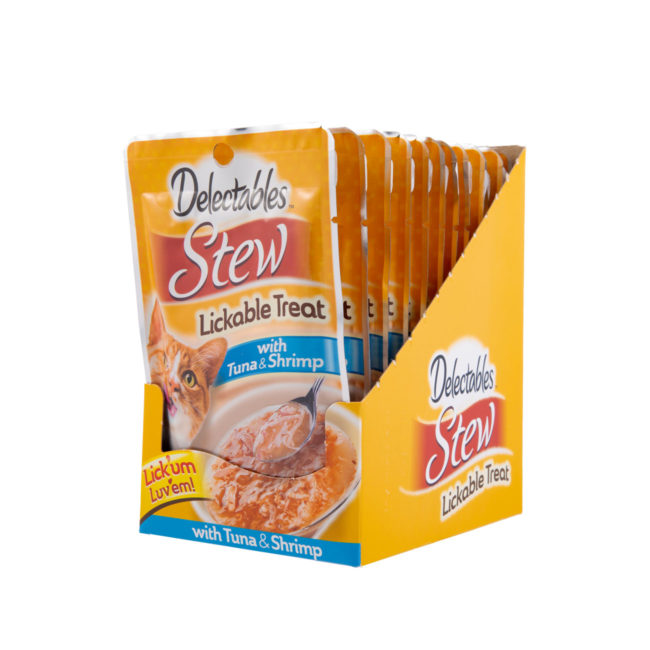 Delectables Lickable Treat Stew with Tuna and Shrimp. Front of opened carton. Hartz Delectables Lickable Treat is the first wet cat treat.