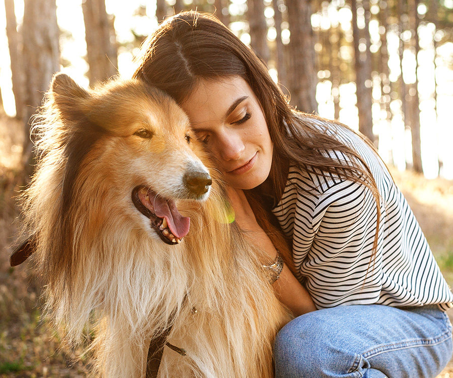 A young woman and an old dog