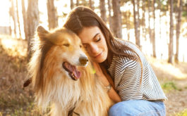 A young woman and an old dog