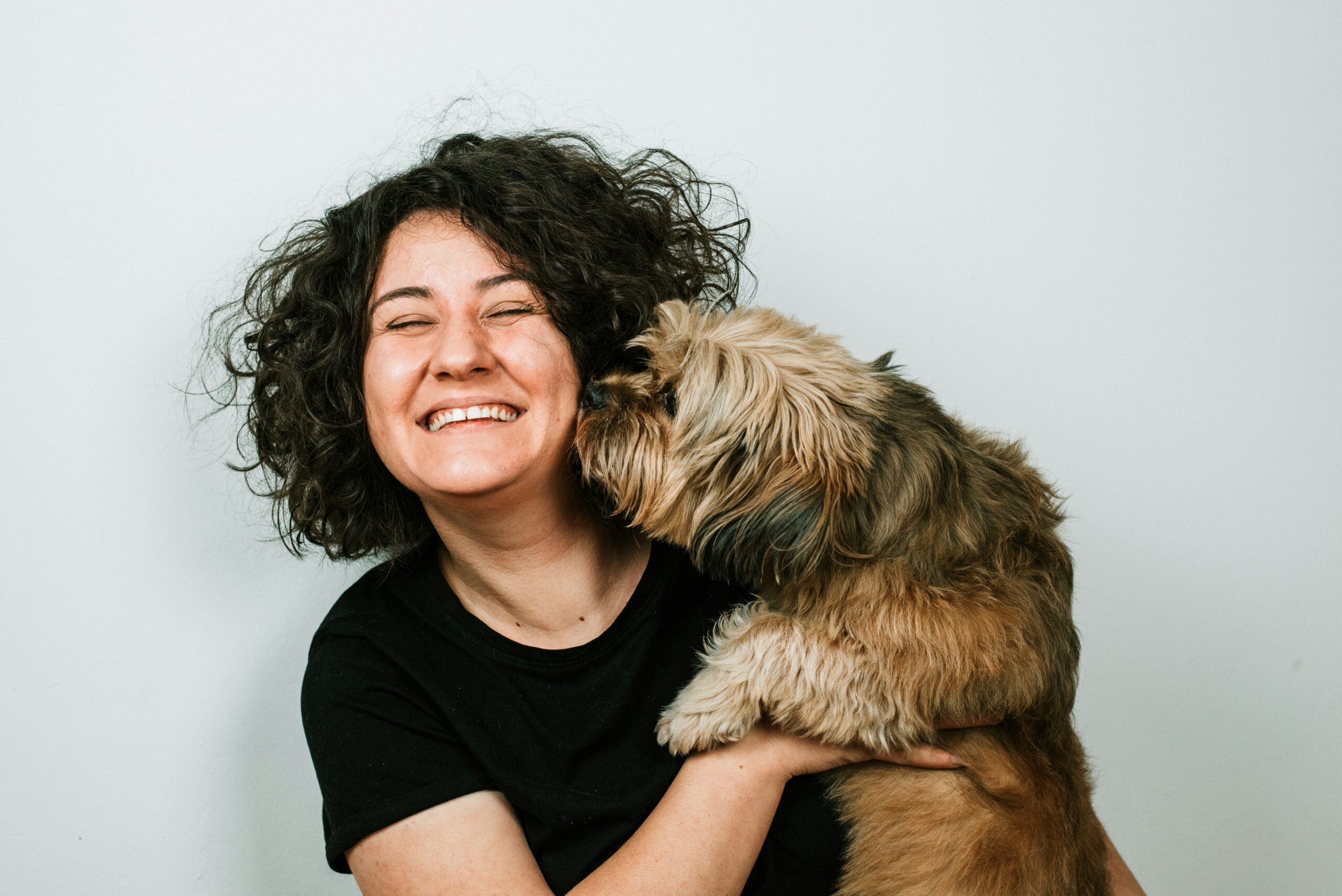 Royalty Free Image from Unsplash.com | Person and dog sharing a special moment 